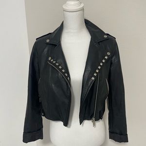 Customized leather jacket / distressed and studs
